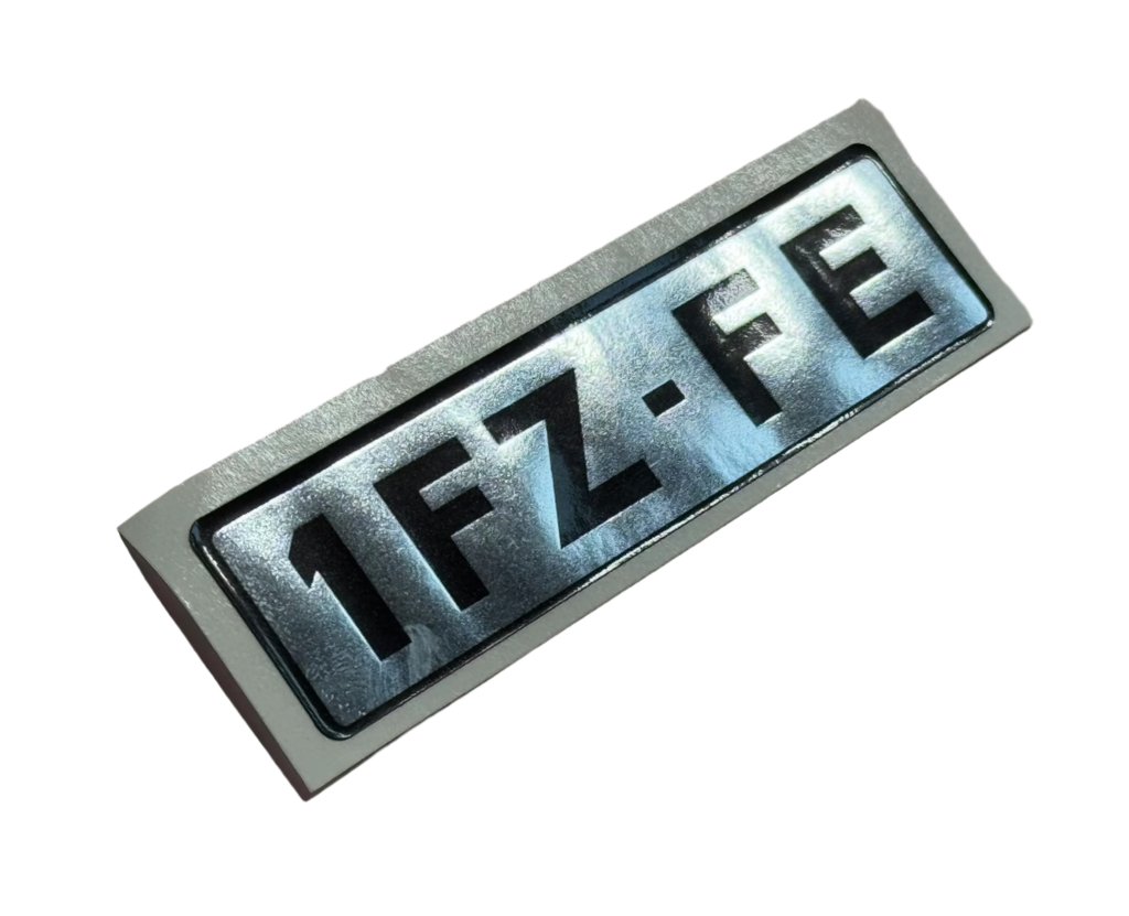 1FZ-FE ENGINE NAME PLATE No. 1  DECAL EMBLEM BADGE Cylinder Head Valve Cover SNOW VERSION Package / SIBERIA-SPEC.   Part # 11291-66020