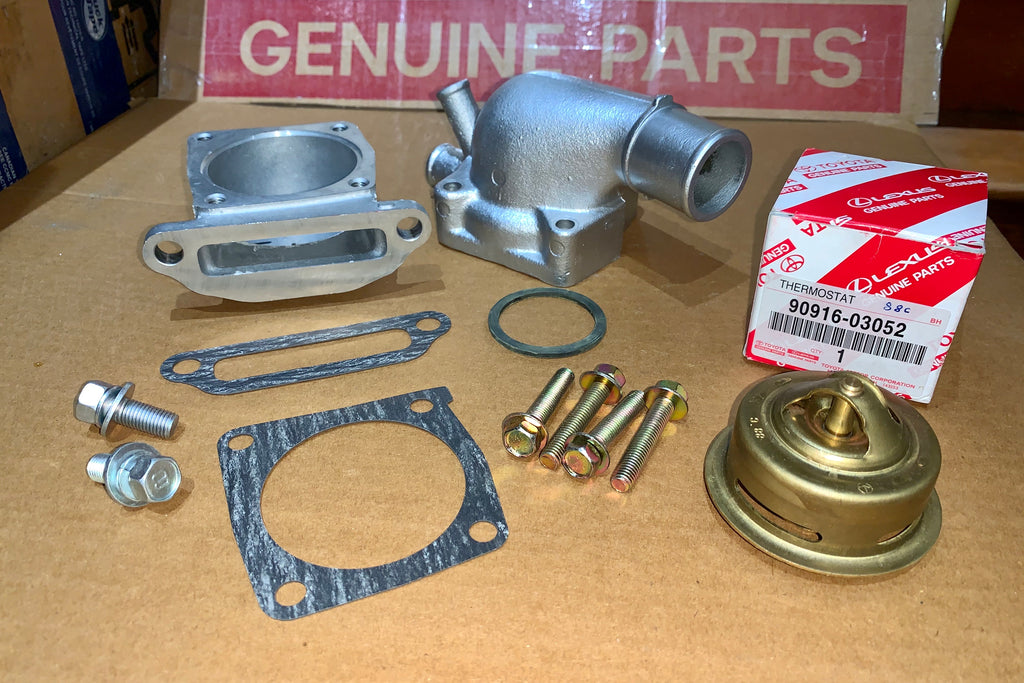 4 BOLT STYLE OEM Toyota Genuine Parts Thermostat Housing 's  Kit for 8/80 - 9/87  2F Land Cruiser FJ40 FJ60 WITH OIL COOLER  Includes all needed parts for a Plug and Play Repair